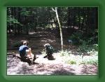 AmicalolaToUnicoi 005 * Mike pumping water while chris tends to his feet * 2048 x 1536 * (1.74MB)